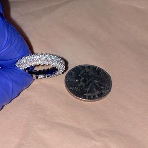 Pave full eternity ring in EUC size small with simulated diamonds.